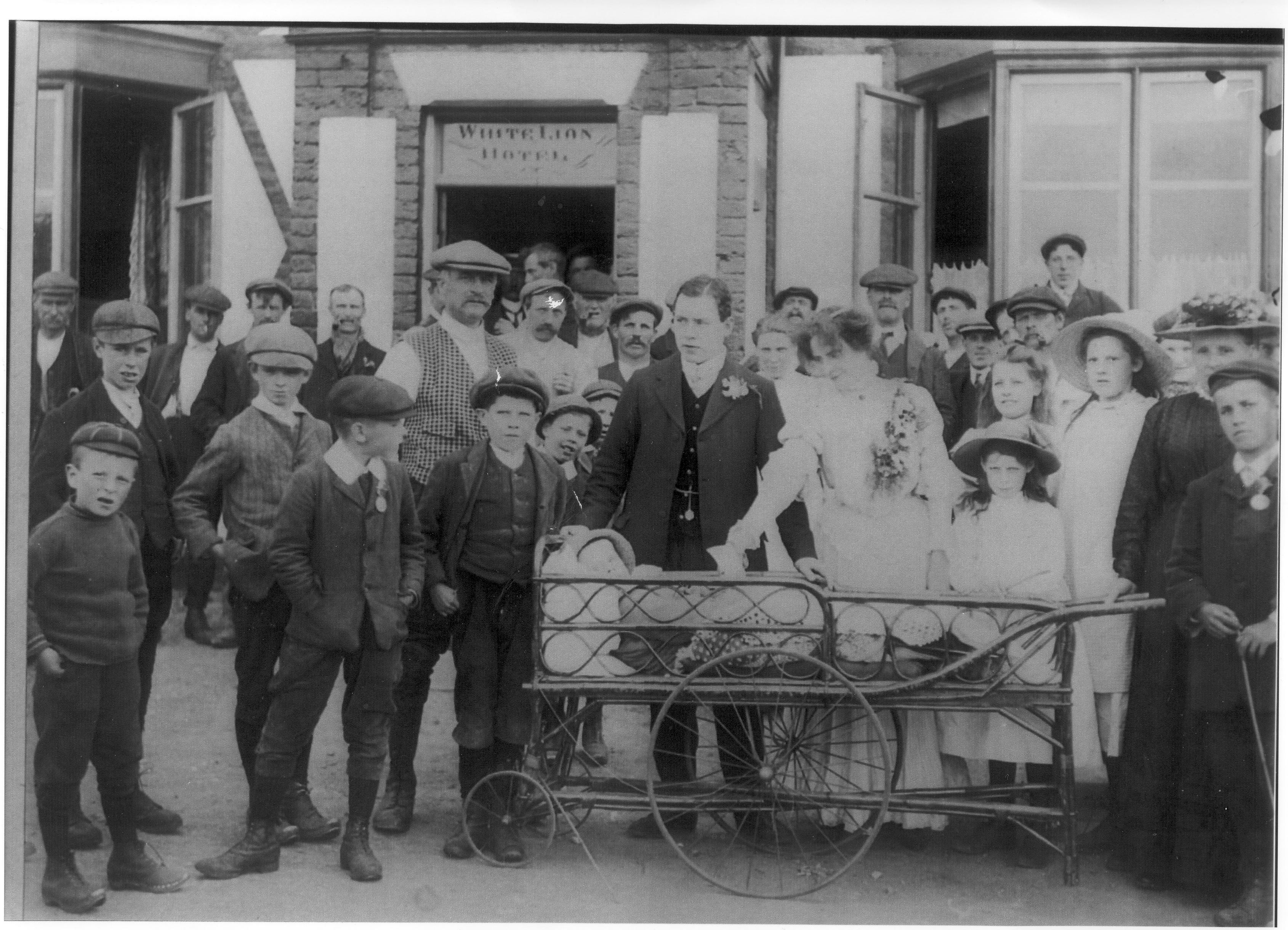 Photograph of a wedding celebration in 1905 at the White Lion, Hankelow.