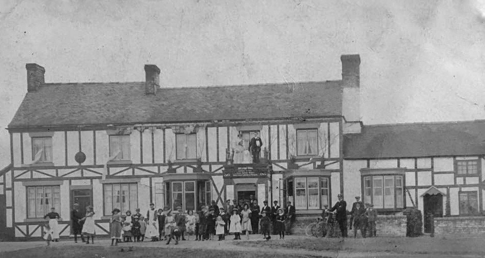 Photograph, possibly of a wedding celebration, at the White Lion, Hankelow, taken (at a guess) in the 1910s