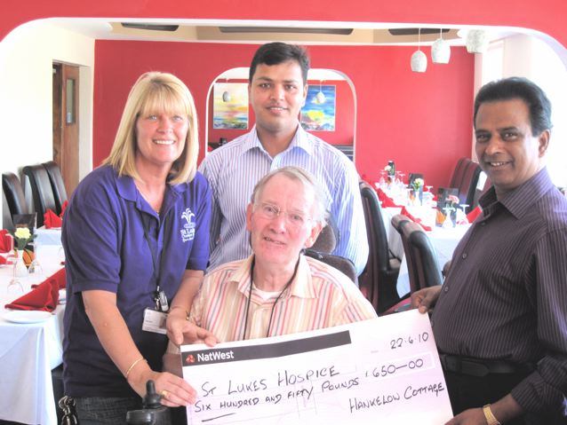The proprietors of Hankelow Cottage Bangladeshi Indian restaurant donate £650 to St. Lukes Cheshire Hospice